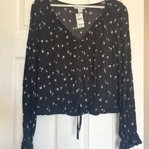 Long sleeve crop top with front tie on bottom